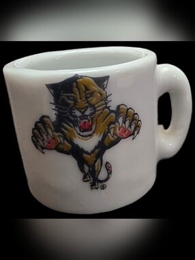 White Florida Panthers mini ceramic mug featuring the classic leaping panther